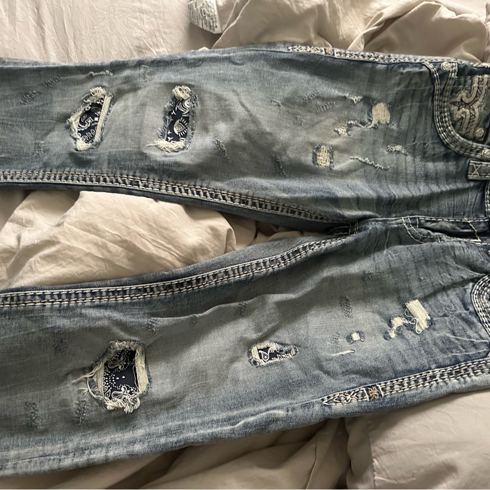 Relaxed Blue Distressed Denim Jeans